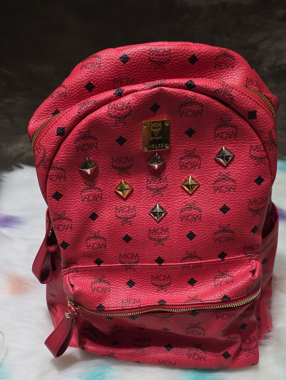 MCM Red Logo Studded Backpack with Gold Hardware
